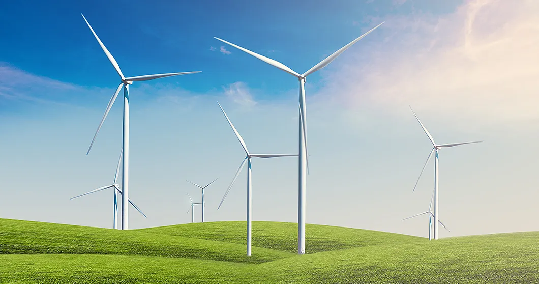Groen landschap met windmolens